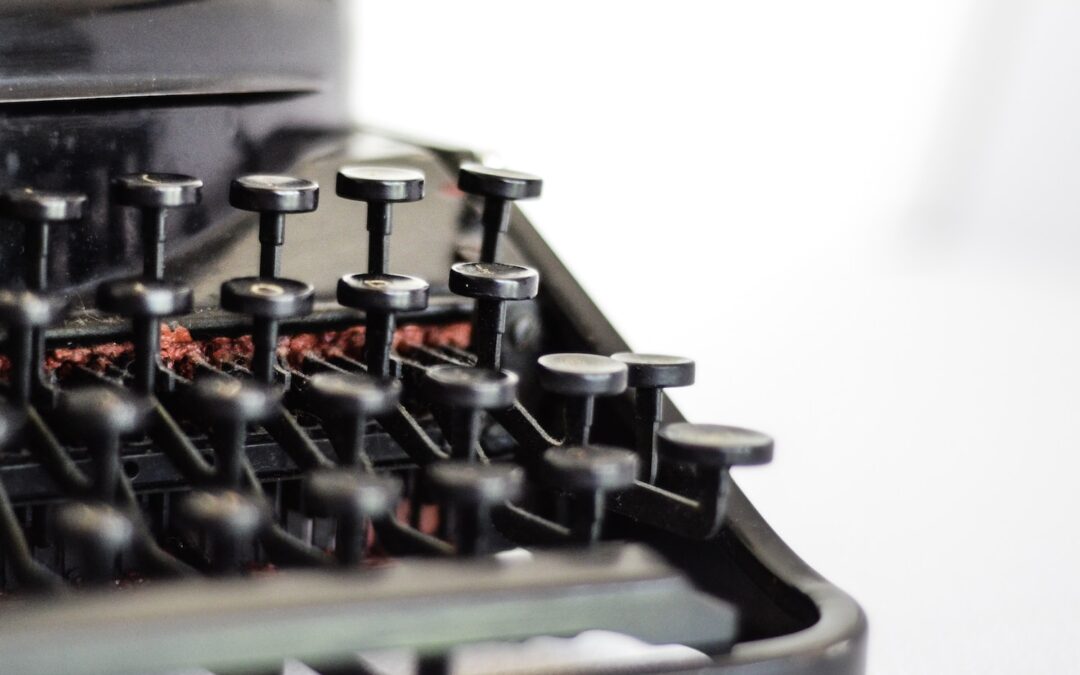 selective focus photography of typewriter keys